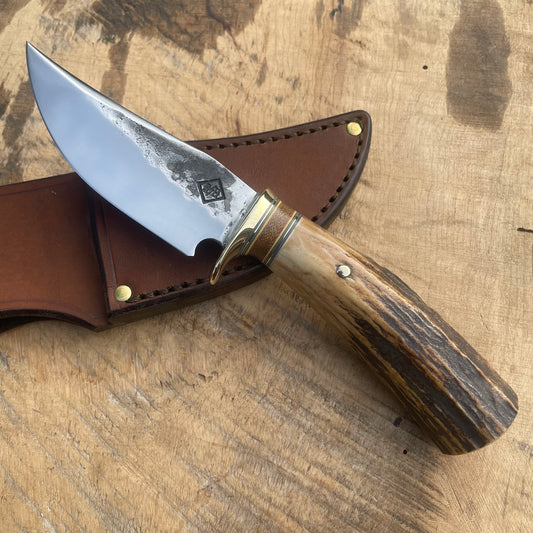 Hammer mark clip point hunter